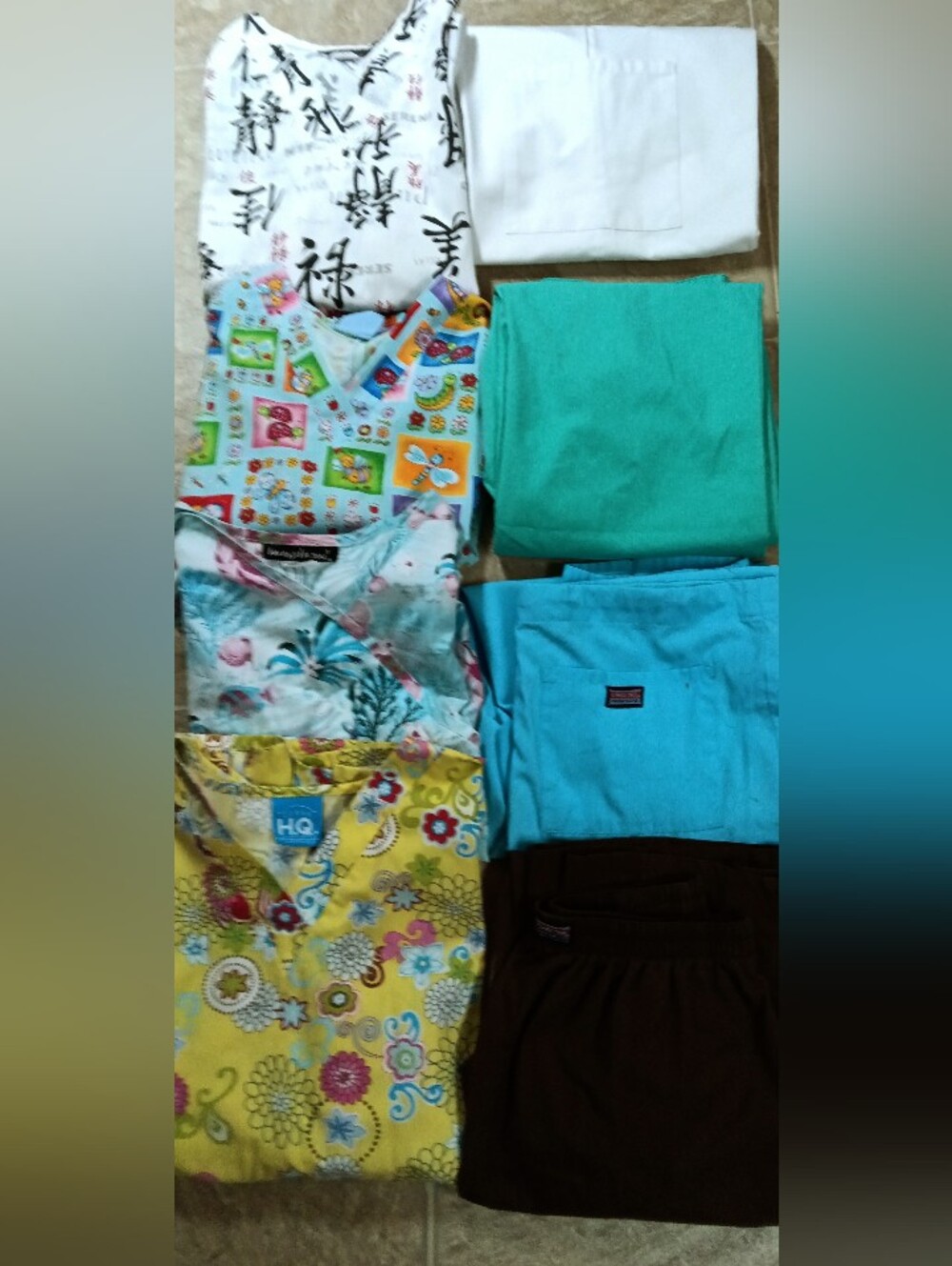 4 matching pair of like new size small scrubs
